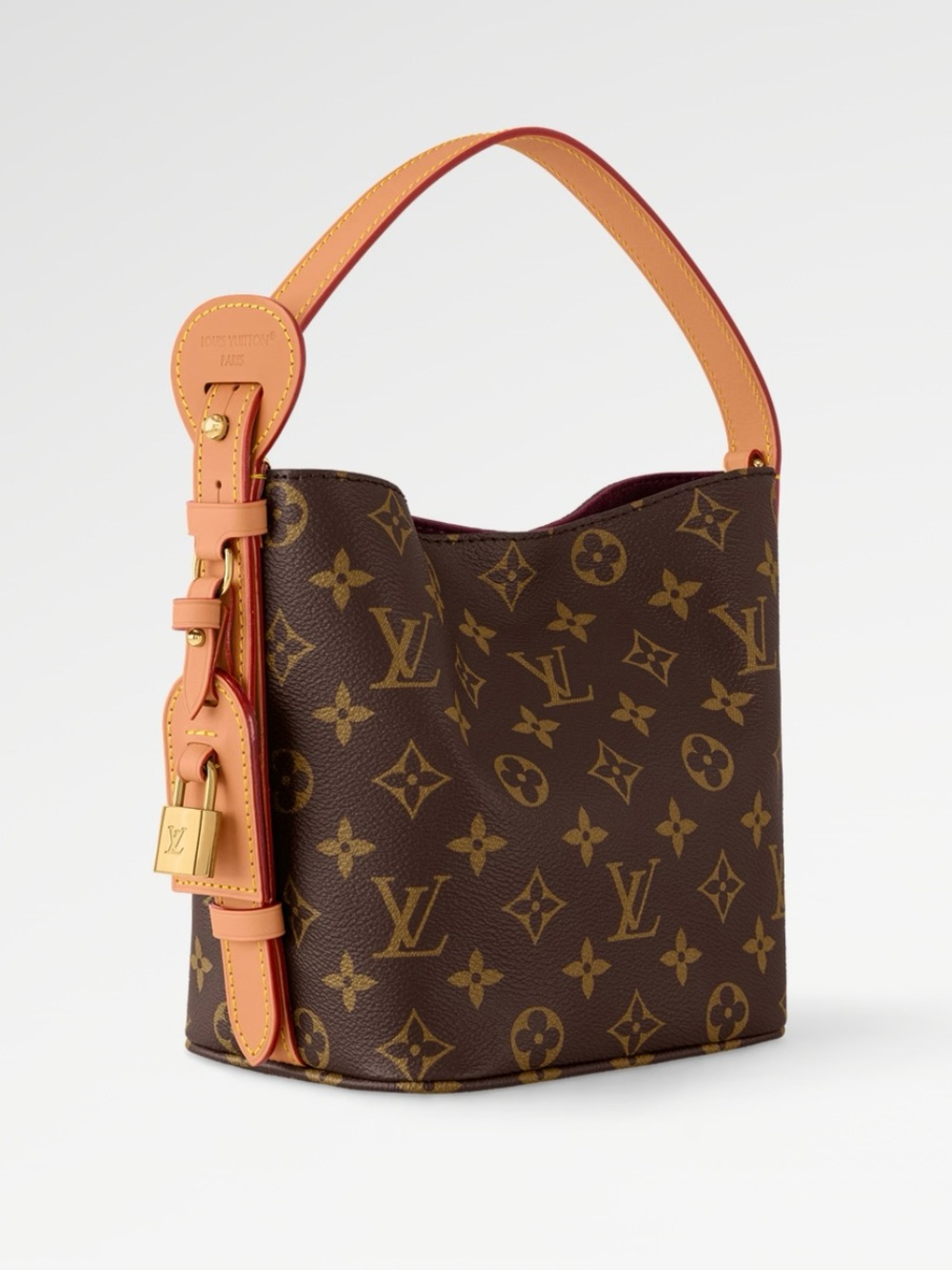 Brown Monogram Mini Bucket Bag with Tan Strap. BB
6.3 inches